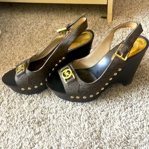 Michael Kors
Brown Mk Charm Sling Wedges.